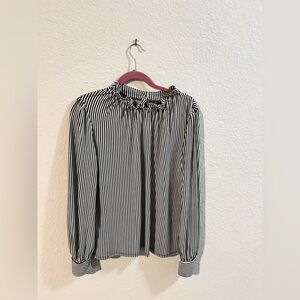Black and white striped blouse. Size large.  Stretch material​